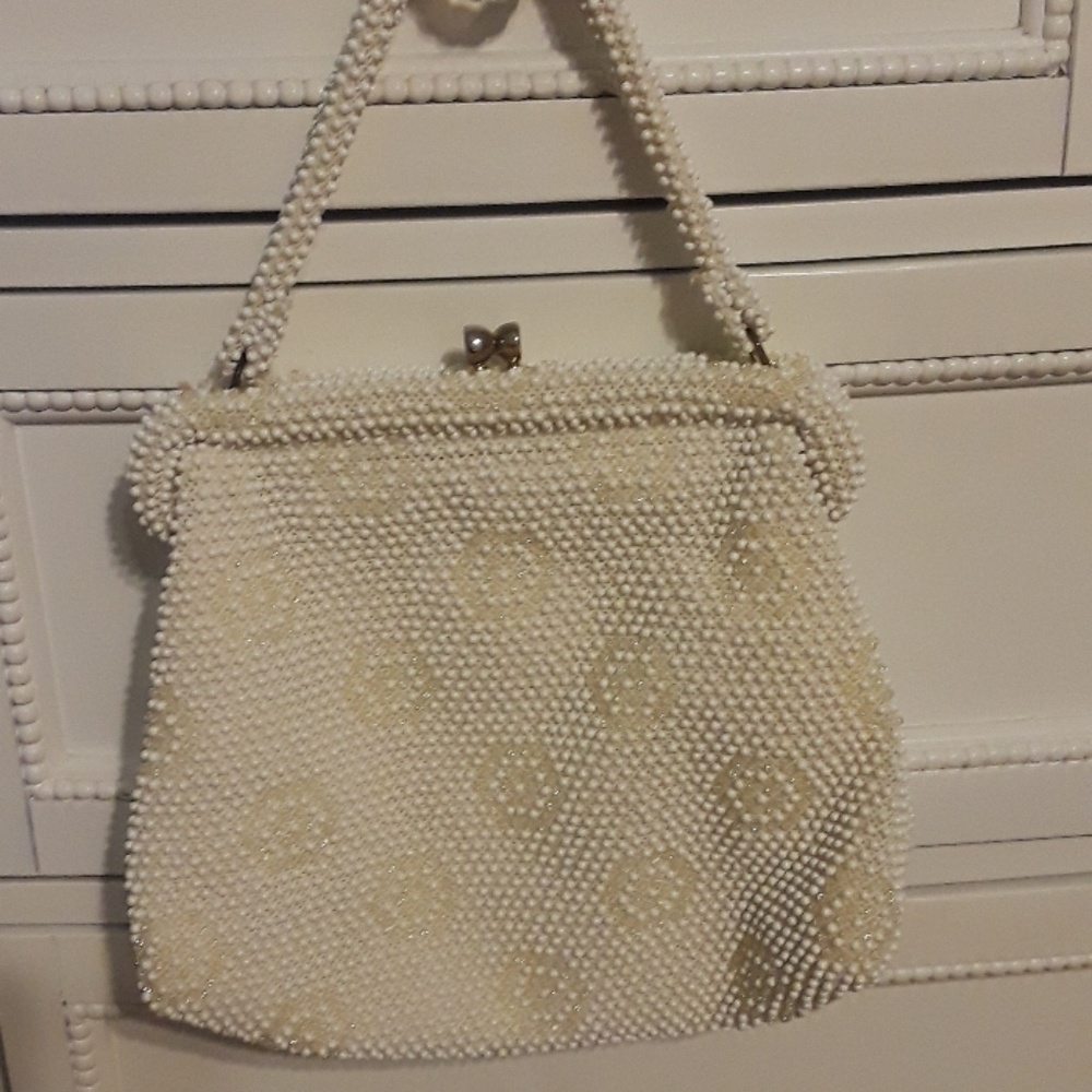 Beautiful creamy white beaded vintage bag.